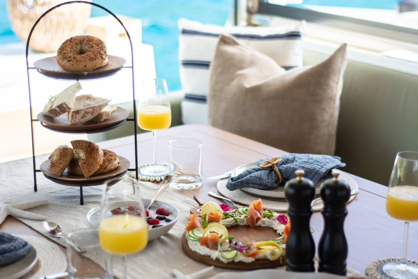 Brunch spread with fresh juice and pastries served aboard Allegra